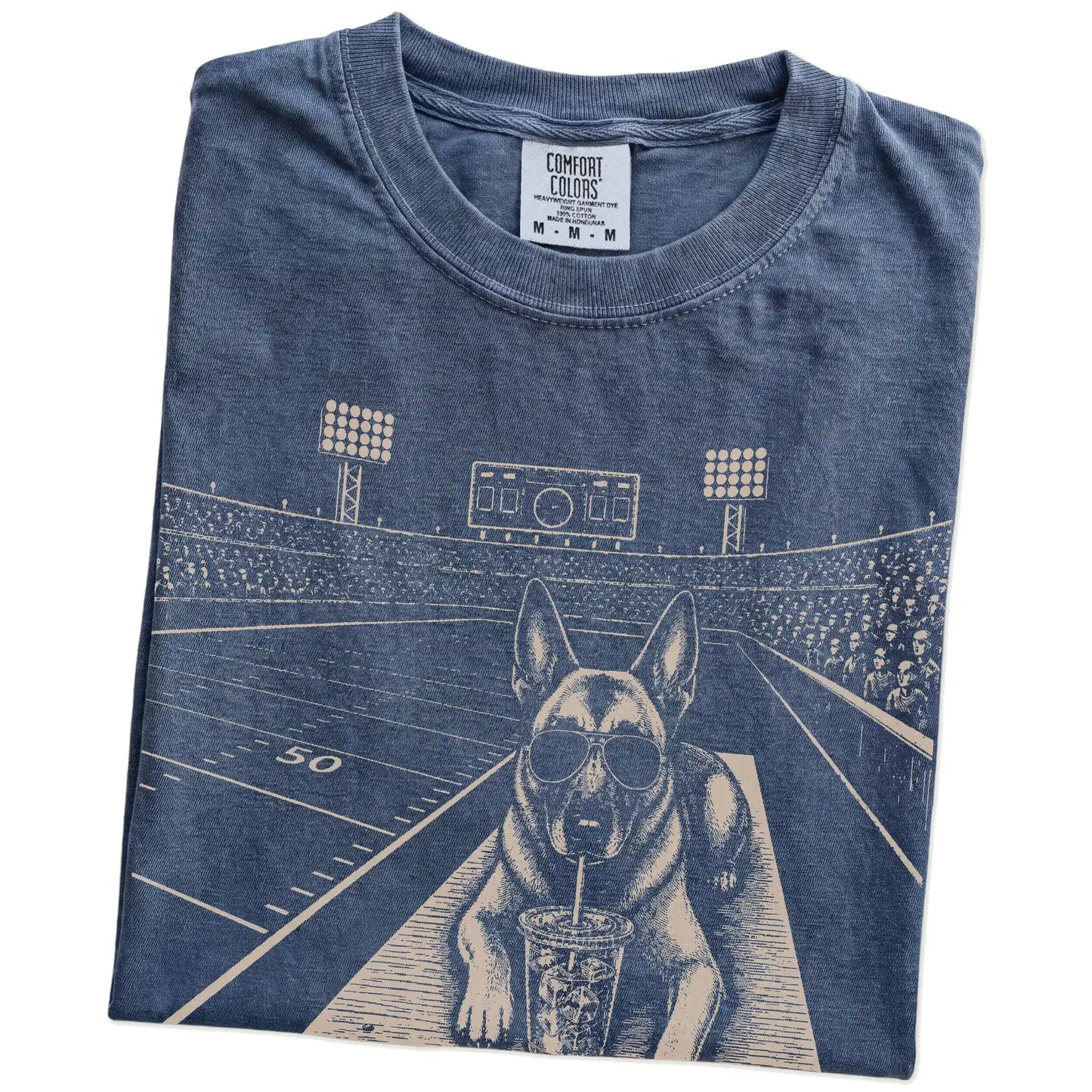 Folded Denim Comfort Colors® T-shirt showing Belgian Malinois ready for football and tailgate season