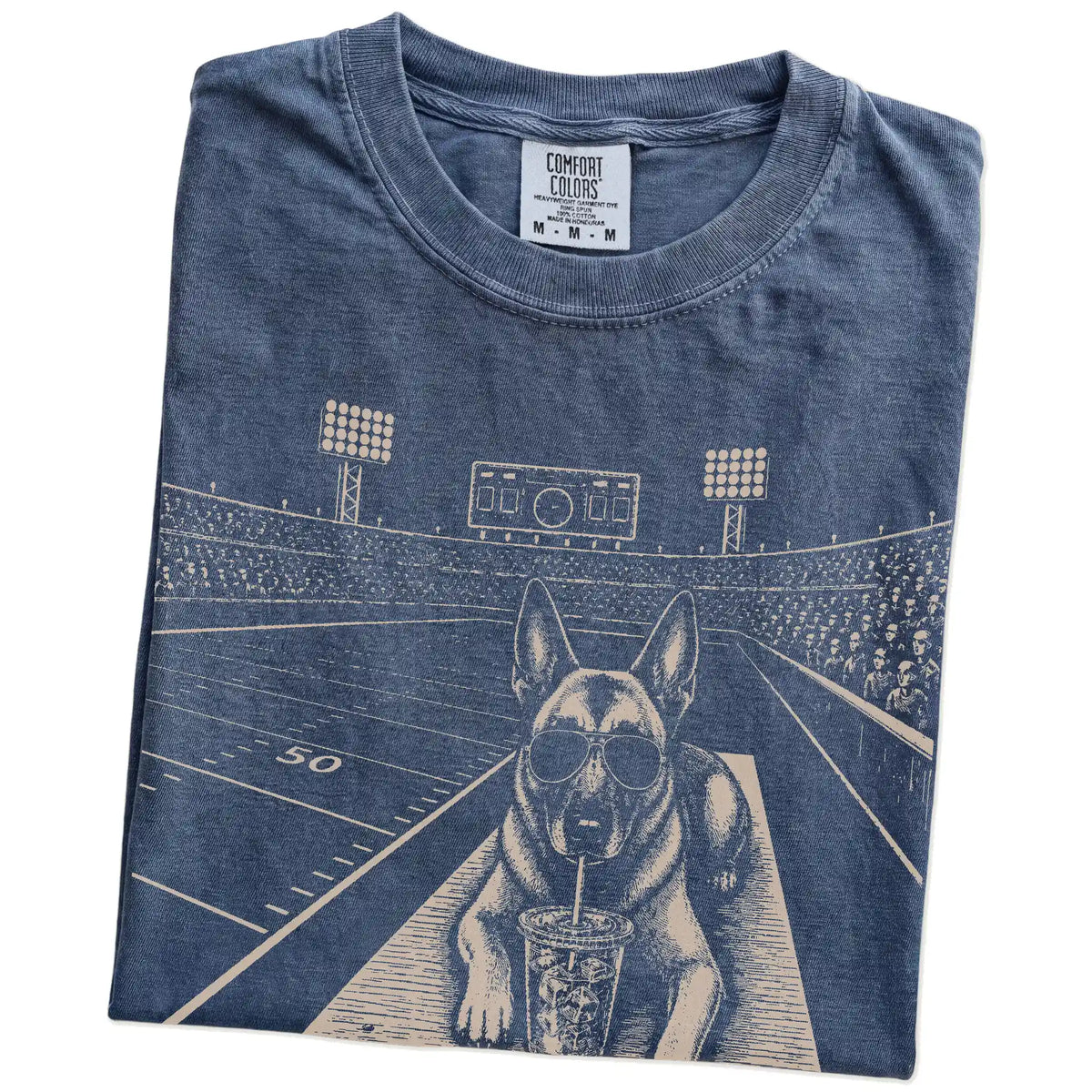 Folded Denim Comfort Colors® T-shirt showing Belgian Malinois ready for football and tailgate season