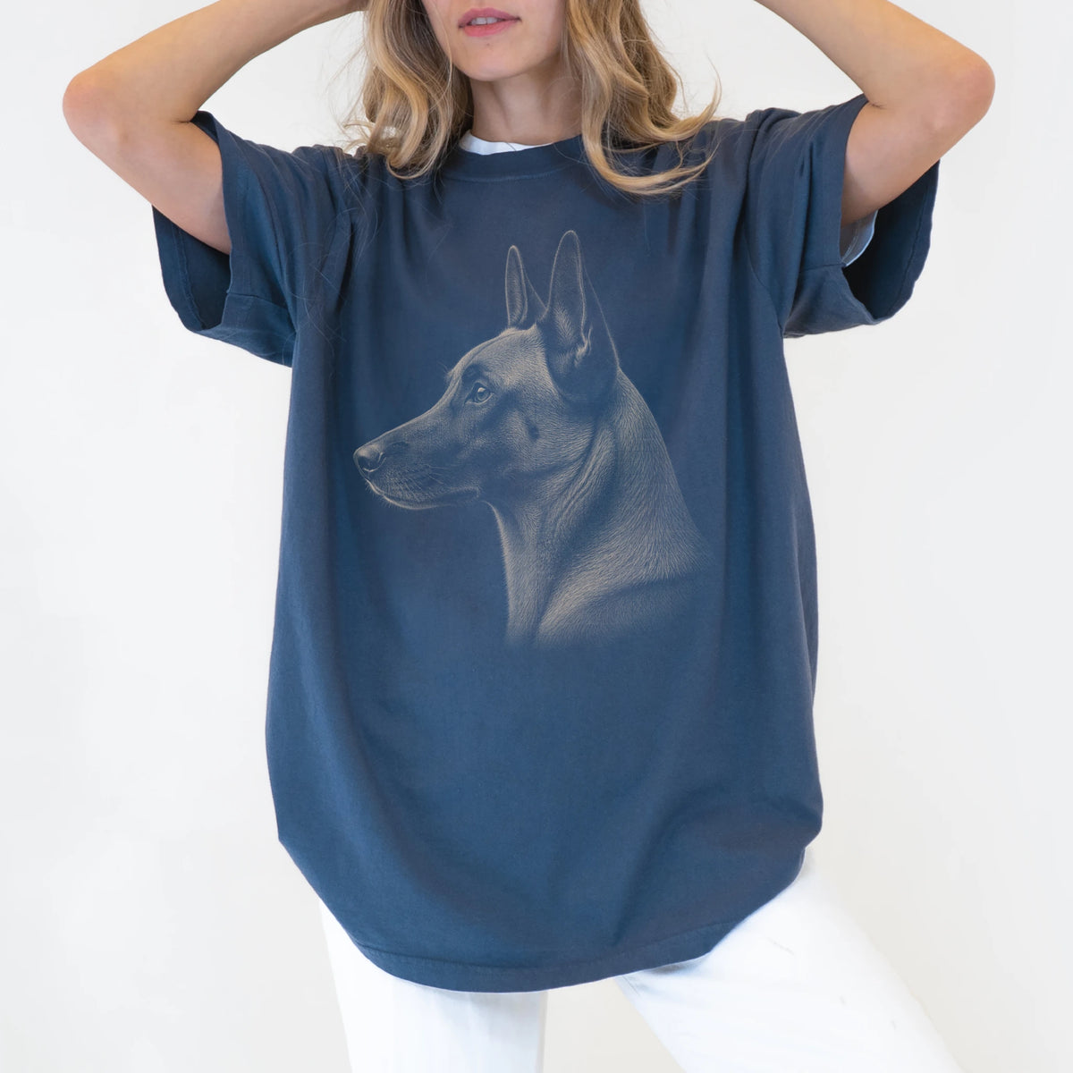 Model wearing a Denim Comfort Colors® T-shirt with a detailed photographic portrait of a Belgian Malinois