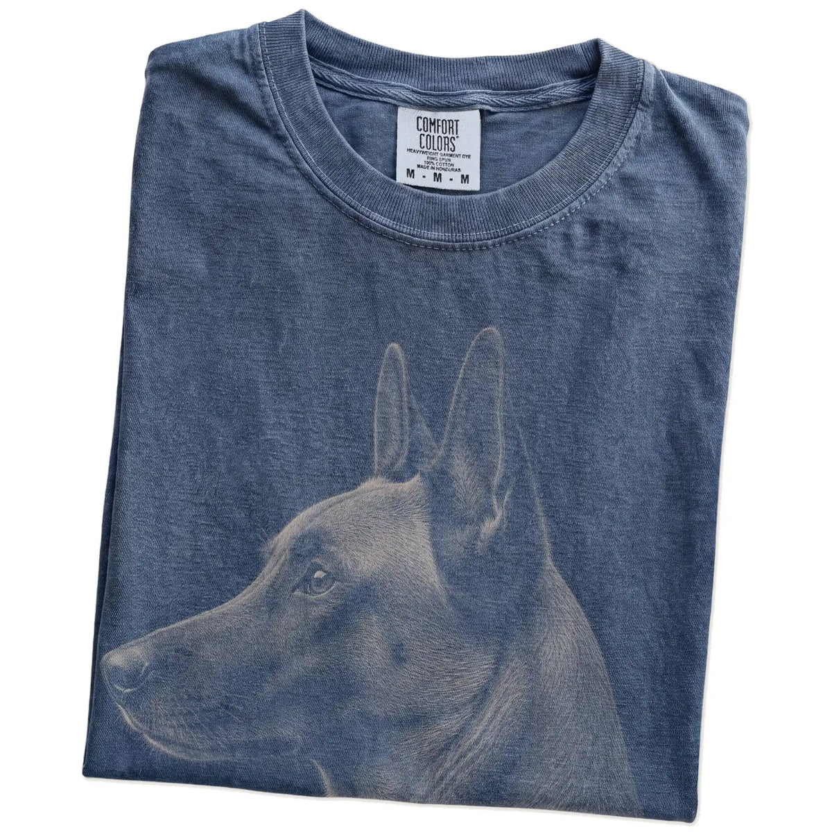 Folded Denim Comfort Colors® T-shirt showing a detailed photographic portrait of a Belgian Malinois