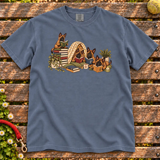 Belgian Malinois puppies reading books in a cozy blanket fort on a Denim T-shirt