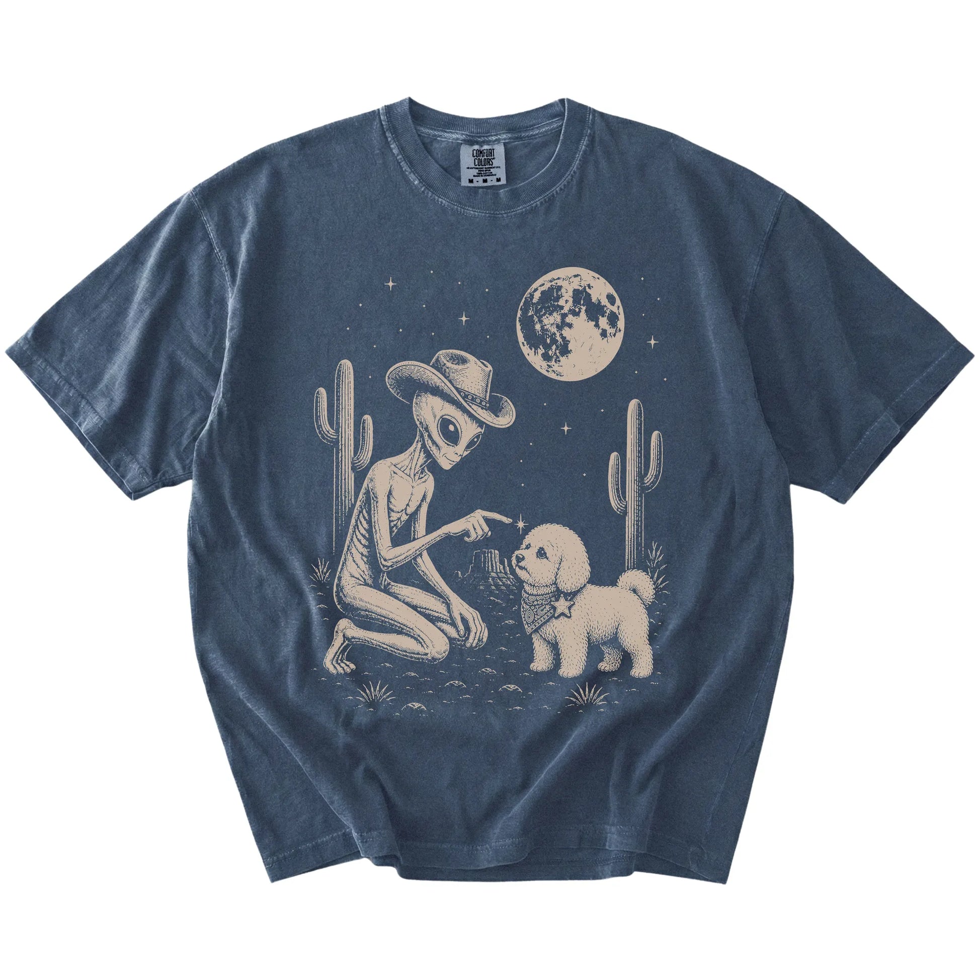 Cowboy alien fist-bumping a Bichon Frise beneath the moon on a Denim Comfort Colors® T-shirt