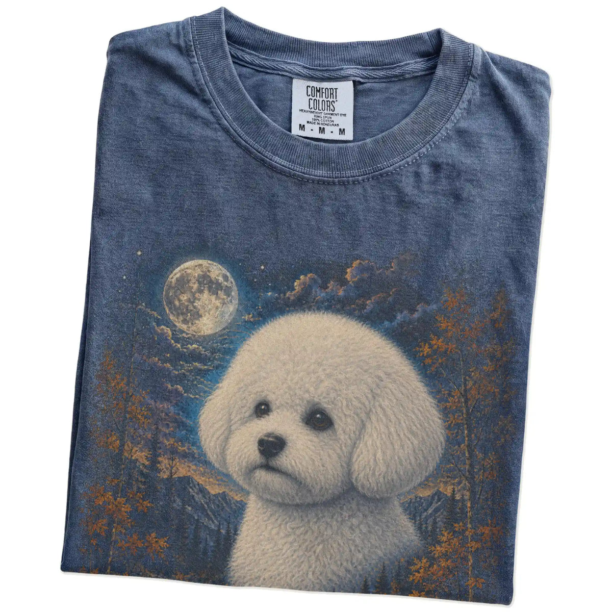 Folded denim T-shirt with Bichon Frise Autumn Moon artwork.