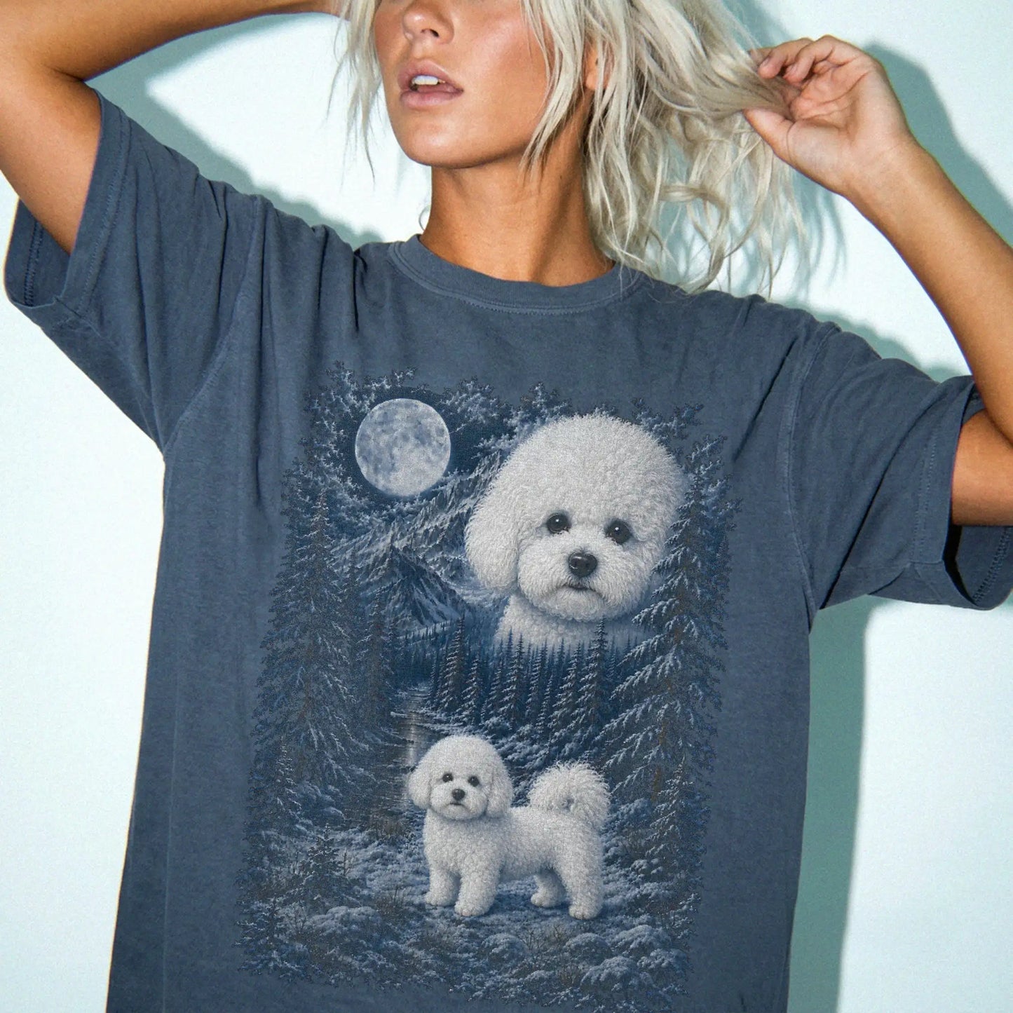 Person wearing a Denim Bichon Frise winter forest t-shirt