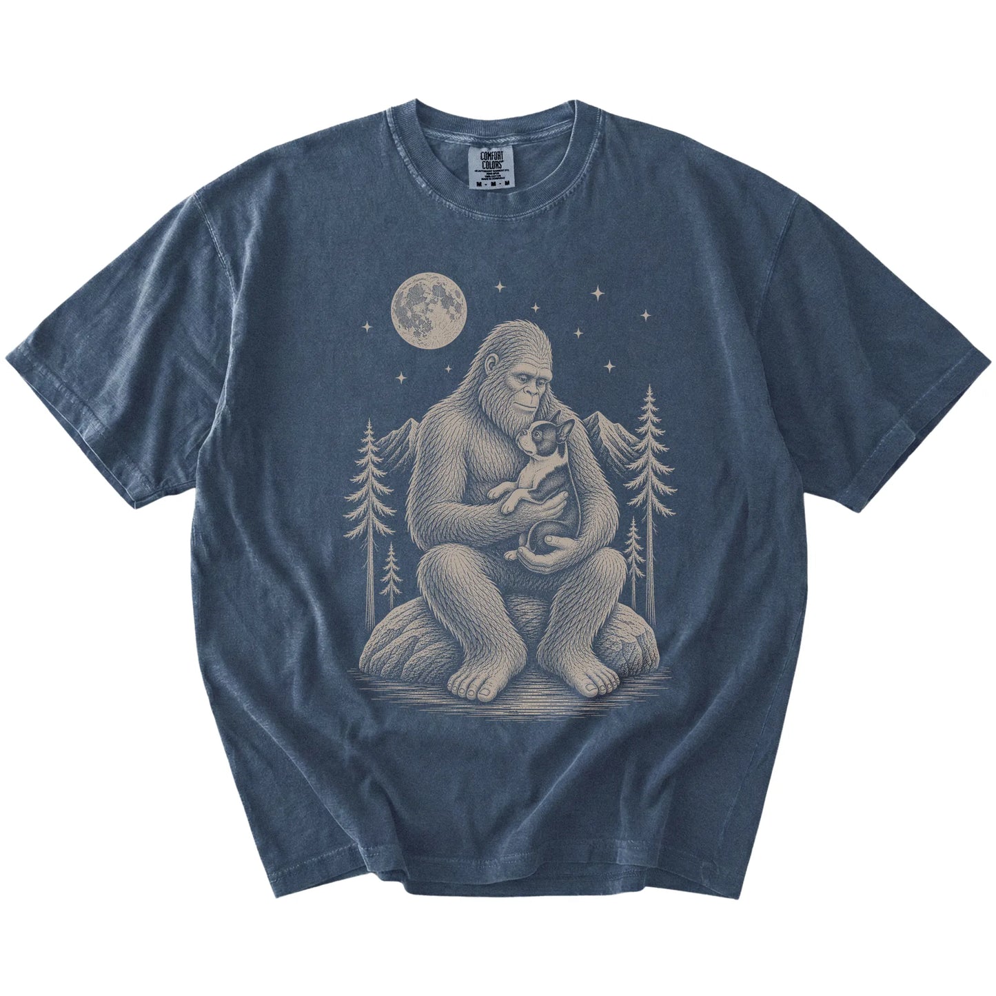 Bigfoot holding a Boston Terrier on a Denim Comfort Colors® T-shirt