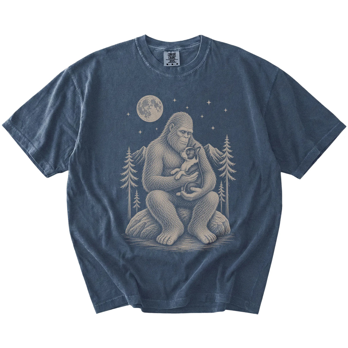 Bigfoot holding a Boston Terrier on a Denim Comfort Colors® T-shirt