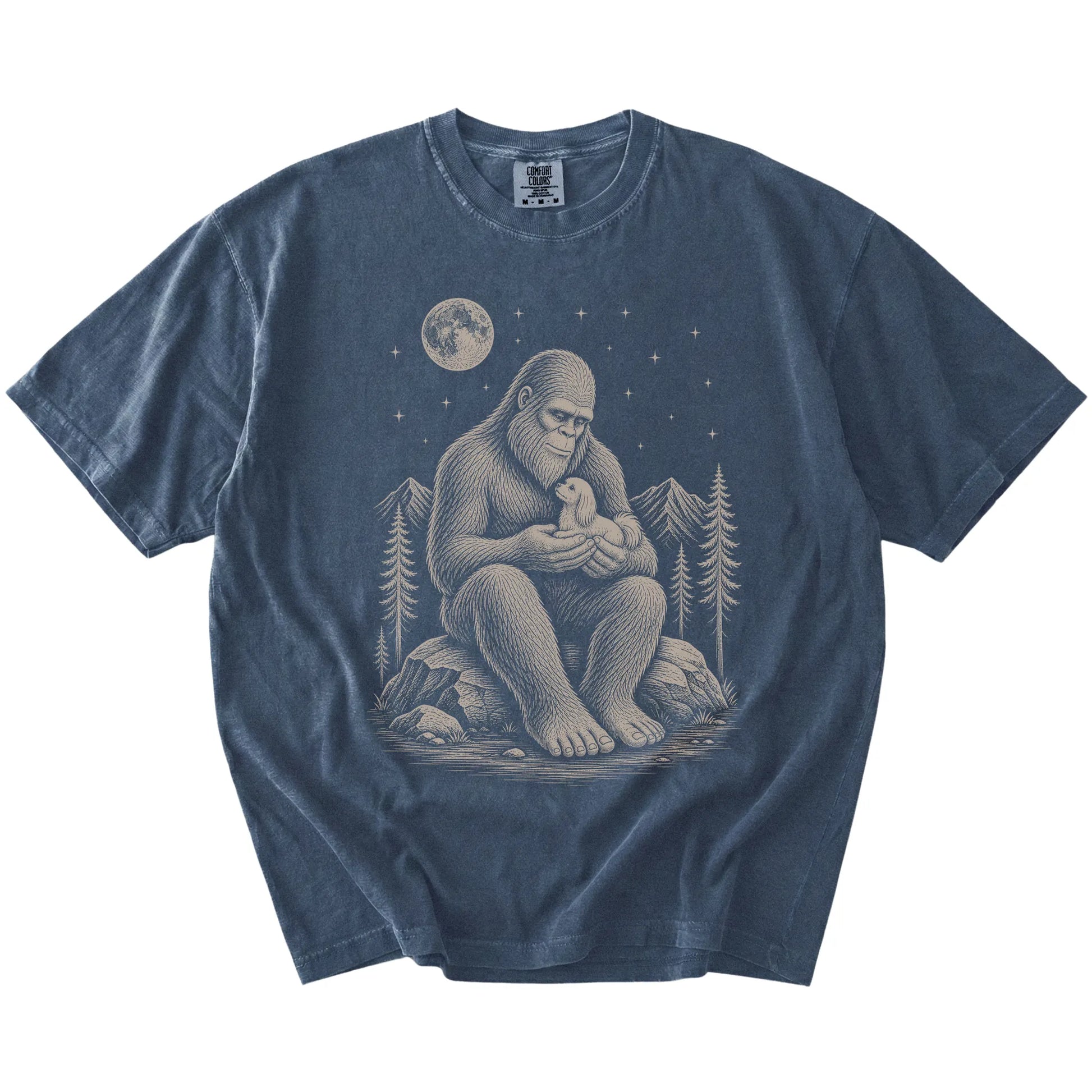 Bigfoot holding a Maltese on a Denim Comfort Colors® T-shirt