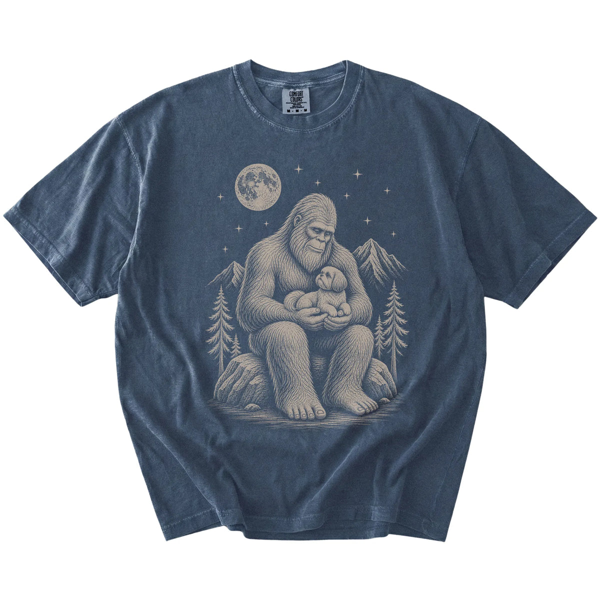 Bigfoot holding a Shih Tzu on a Denim Comfort Colors® T-shirt