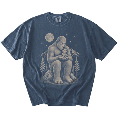 Bigfoot holding a Yorkie on a Denim Comfort Colors® T-shirt