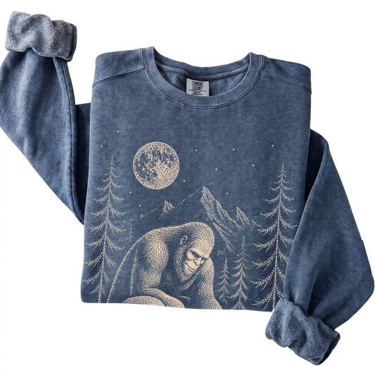 Denim Comfort Colors sweatshirt featuring Bigfoot petting a Chihuahua
