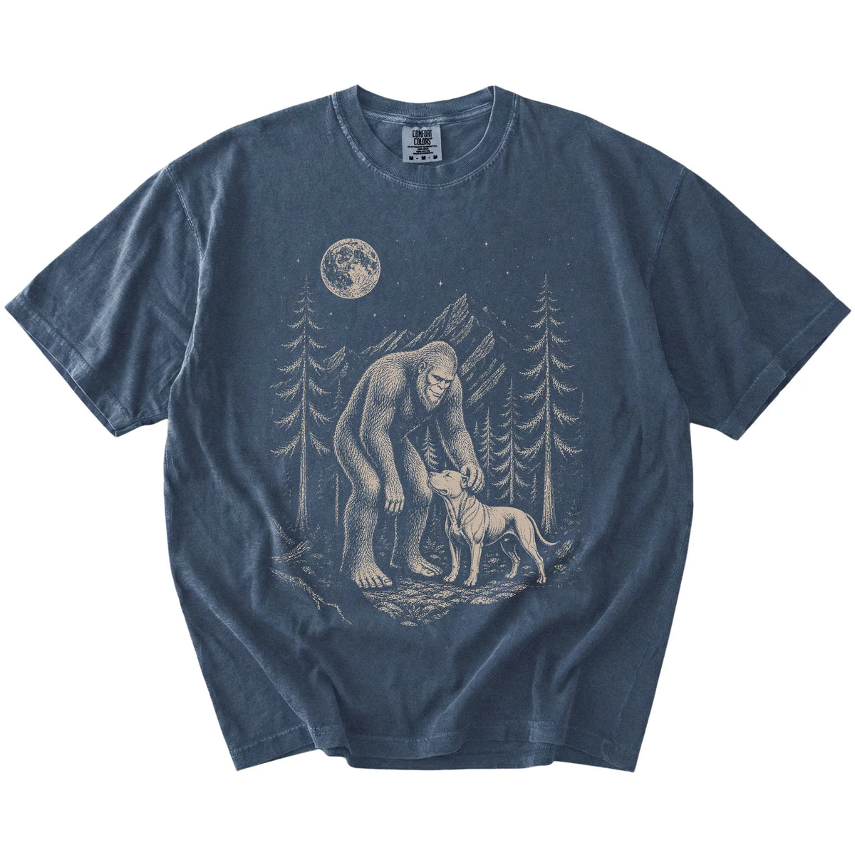 Bigfoot petting a Pitbull beneath the moon in a pine forest on a Denim Comfort Colors® T-shirt