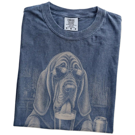 Folded Denim Comfort Colors® t-shirt showing Bloodhound sneaking a drink from a pint