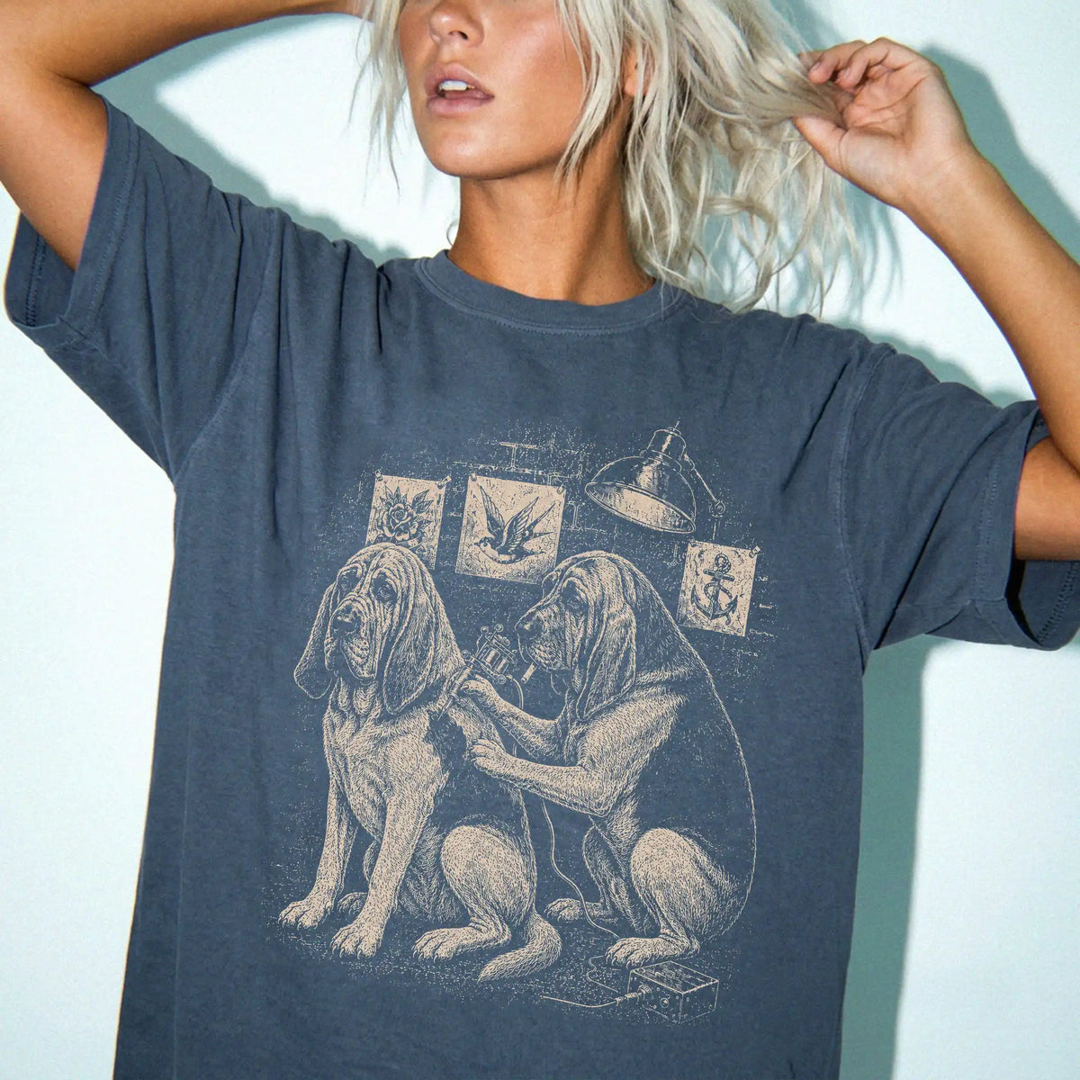 Person wearing a Denim Bloodhound Tattoo t-shirt