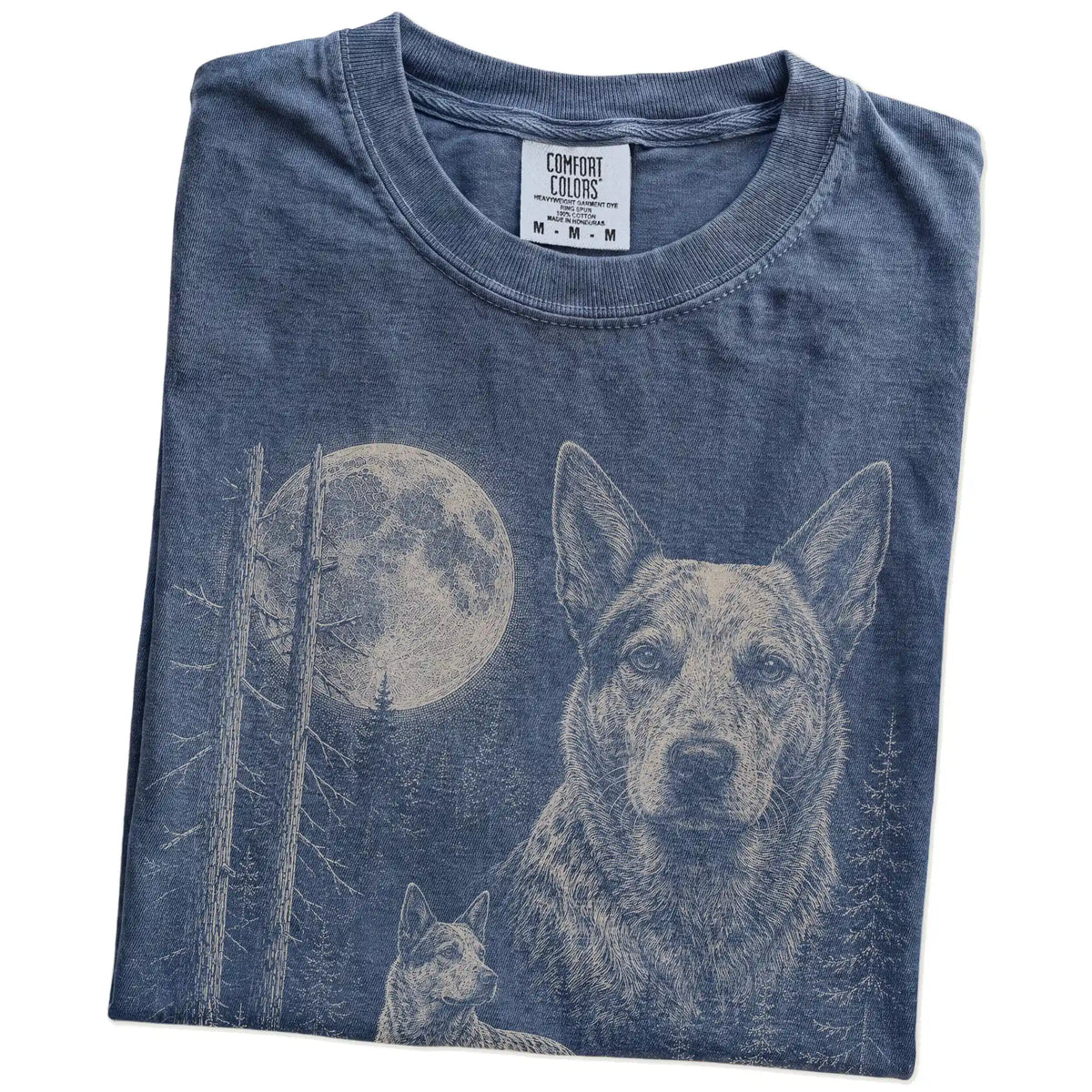 Folded Denim Blue Heeler Moonlit Forest T-Shirt showing the graphic