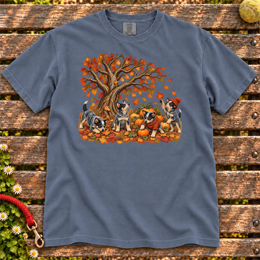 Four Blue Heeler puppies with pumpkins beneath an autumn tree on a Denim garment-dyed T-shirt