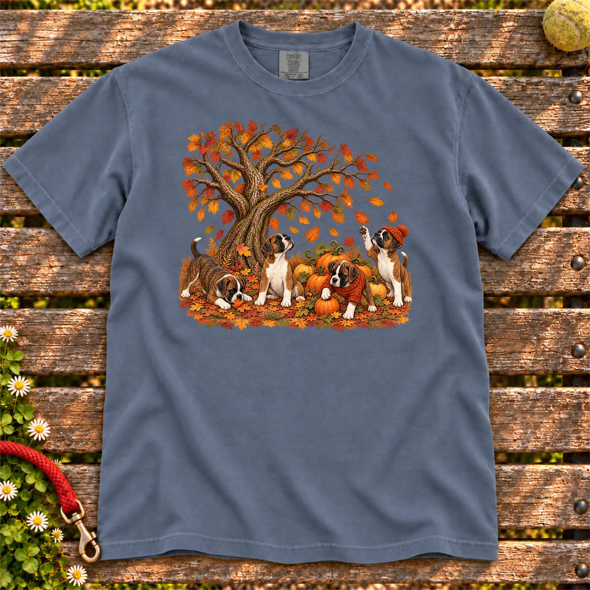 Four Boxer puppies with pumpkins beneath an autumn tree on a Denim garment-dyed T-shirt
