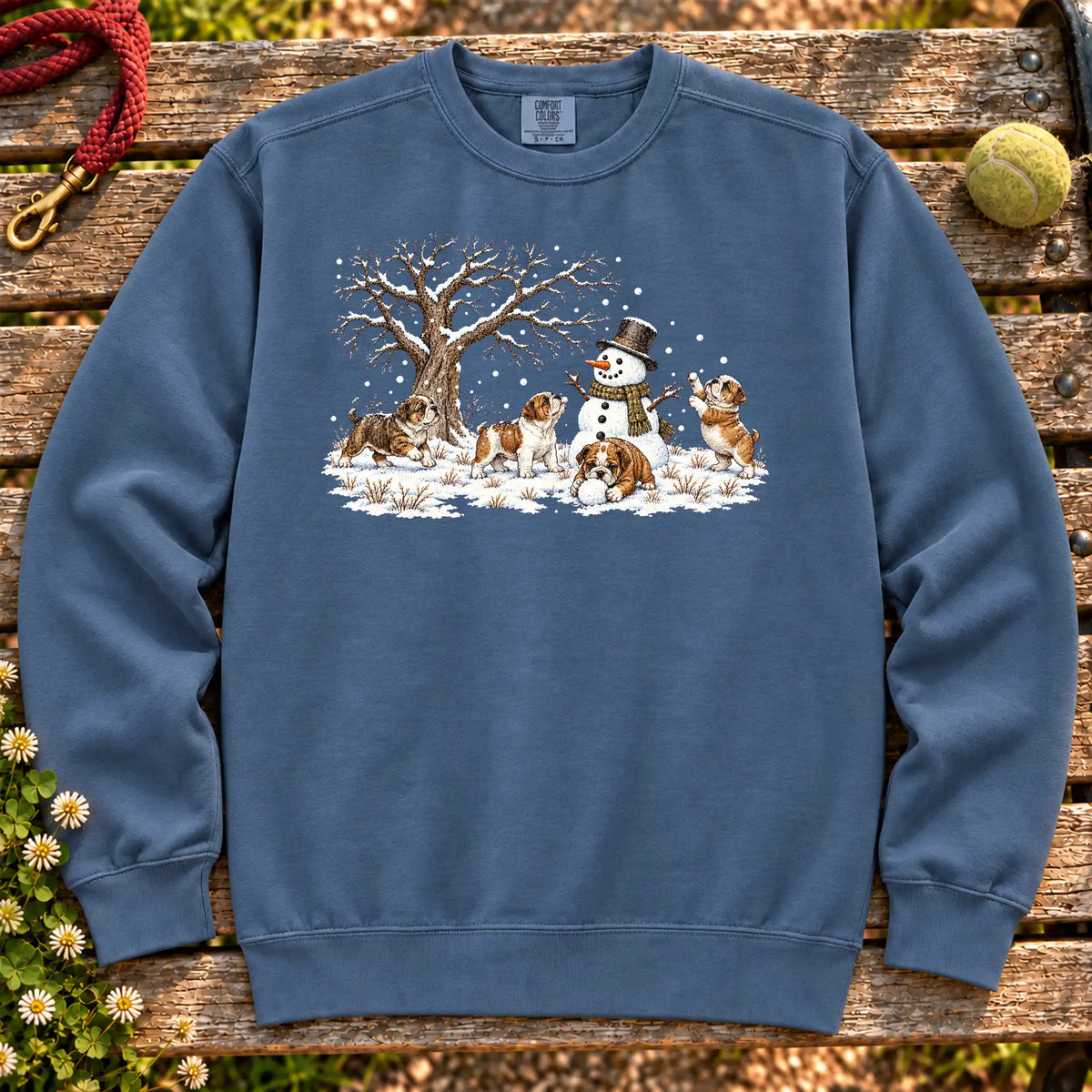 Bulldog puppies playing in snow with a snowman on a Denim sweatshirt