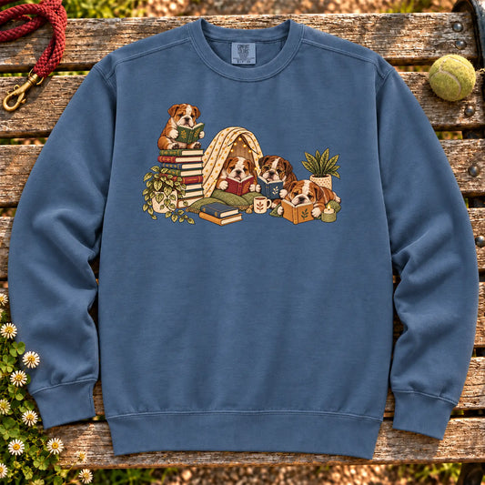 Bulldog puppies reading books in a cozy blanket fort on a Denim sweatshirt