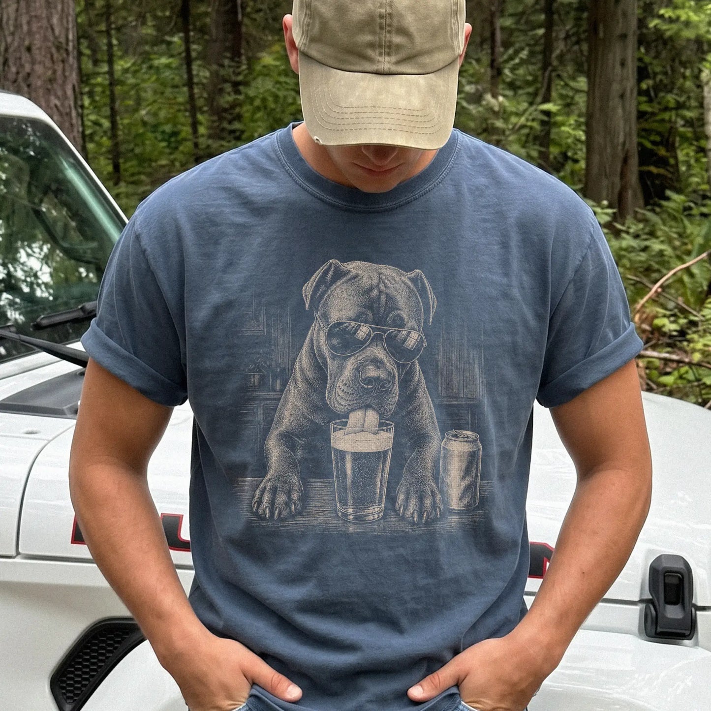 Model wearing a Denim Comfort Colors® t-shirt with Cane Corso sneaking a drink from a pint