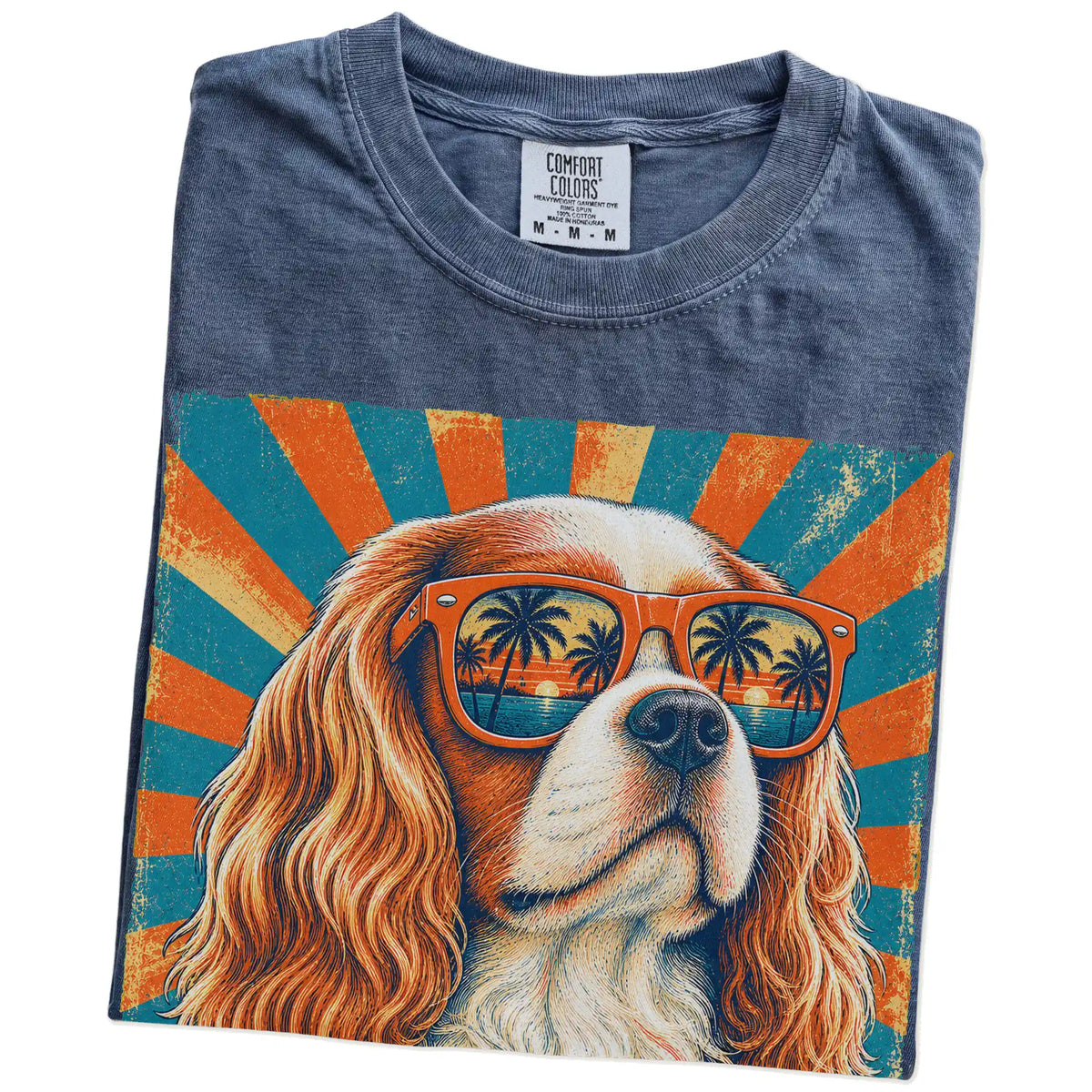 Retro Cavalier King Charles Spaniel Dad design on a Denim Comfort Colors T-shirt folded detail