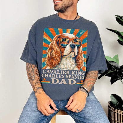 Retro Cavalier King Charles Spaniel Dad design on a Denim Comfort Colors T-shirt worn by a model
