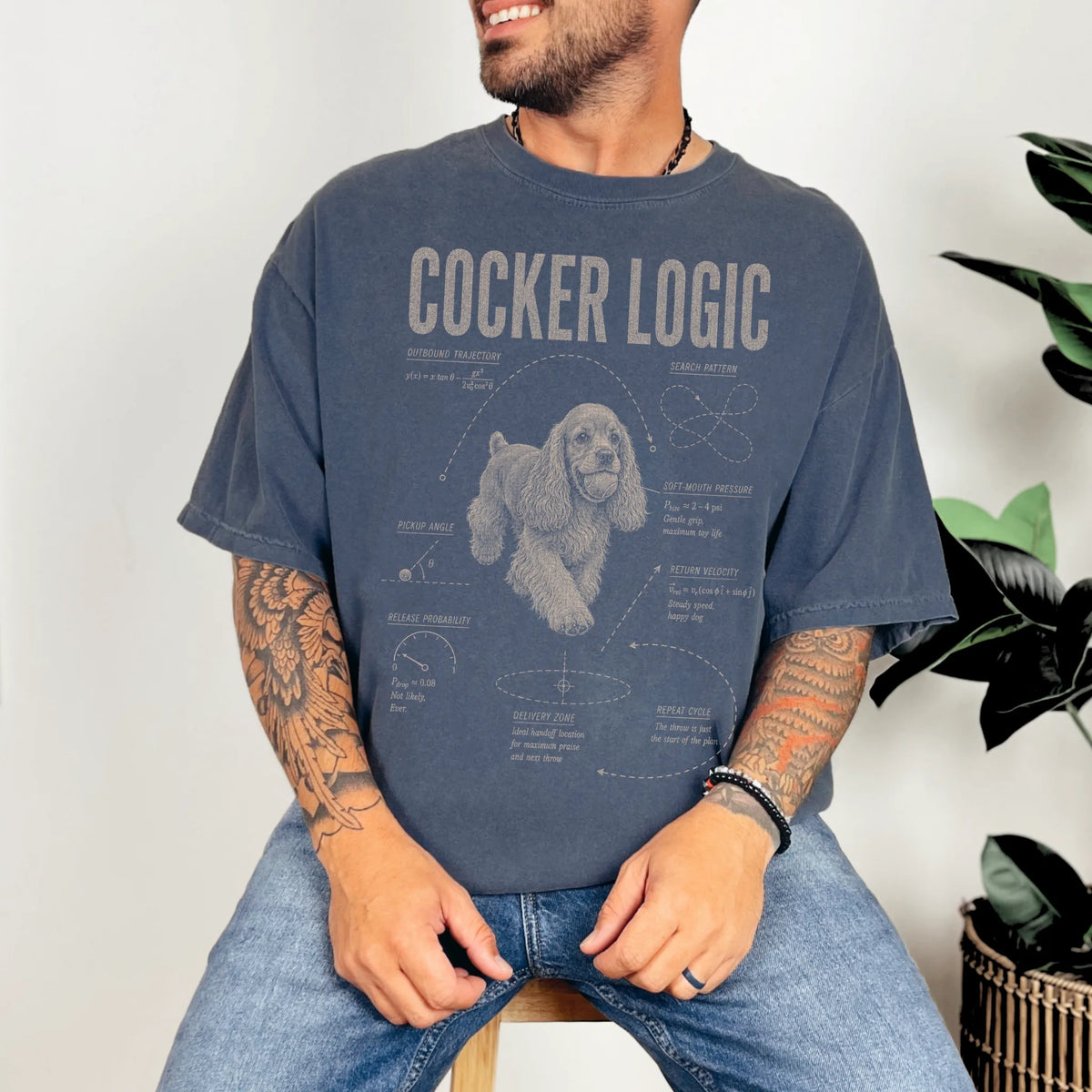 Man wearing a Denim Cocker Spaniel Logic T-Shirt