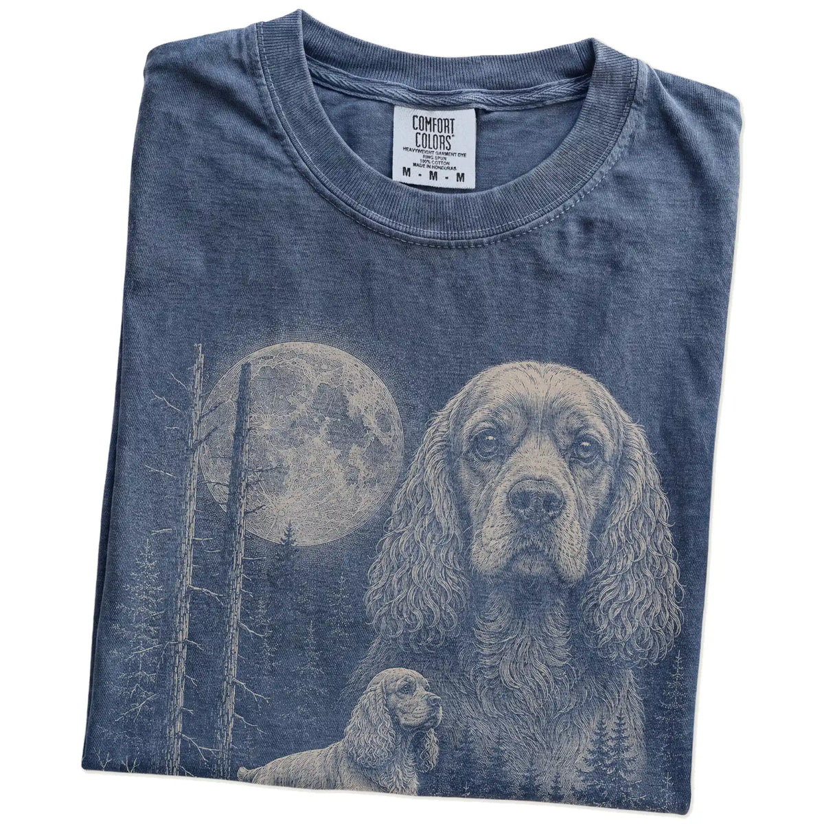 Folded Denim Cocker Spaniel Moonlit Forest T-Shirt showing the graphic