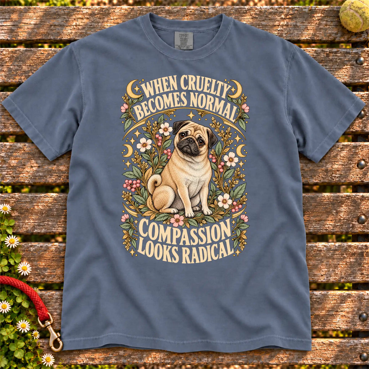 Compassion Looks Radical Pug design on a Denim Comfort Colors T-shirt