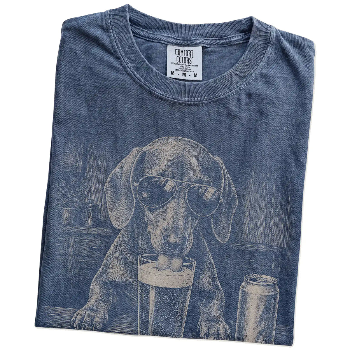 Folded Denim Comfort Colors® t-shirt showing Dachshund sneaking a drink from a pint