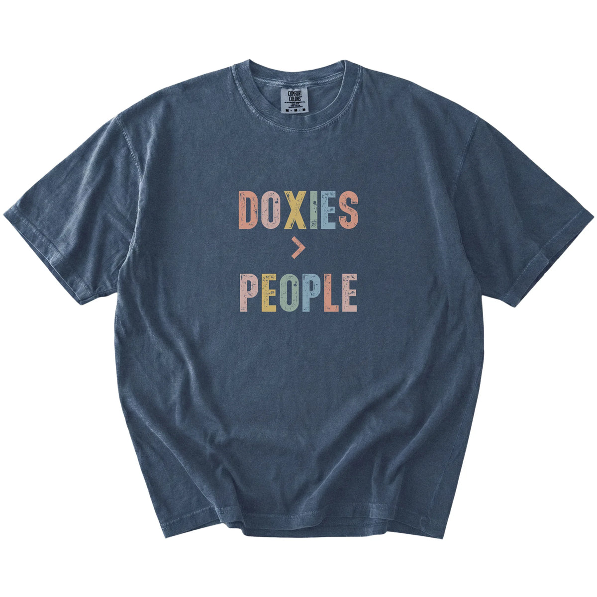 “Dachshunds > People” text on a Denim Comfort Colors® T-shirt