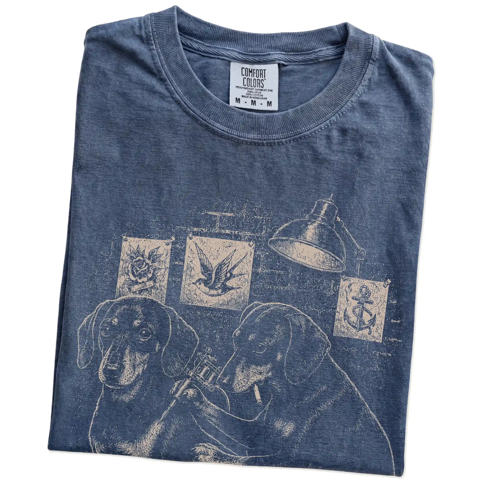 Folded Denim Dachshund Tattoo t-shirt showing the graphic