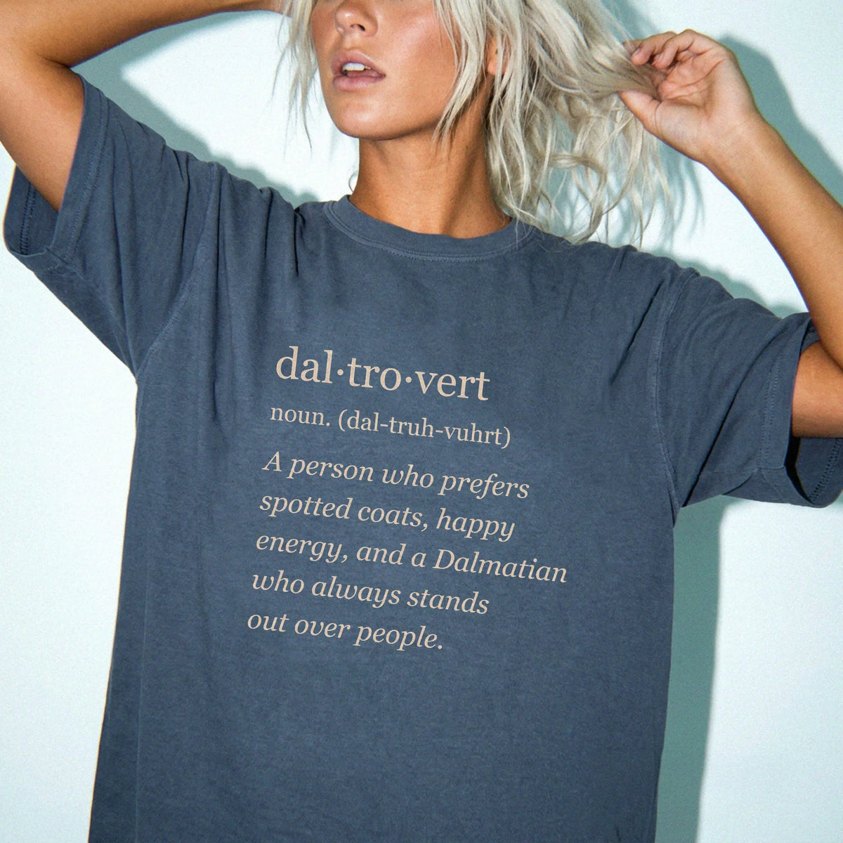 Woman wearing a Denim Dalmatian Tro-Vert Comfort Colors T-shirt