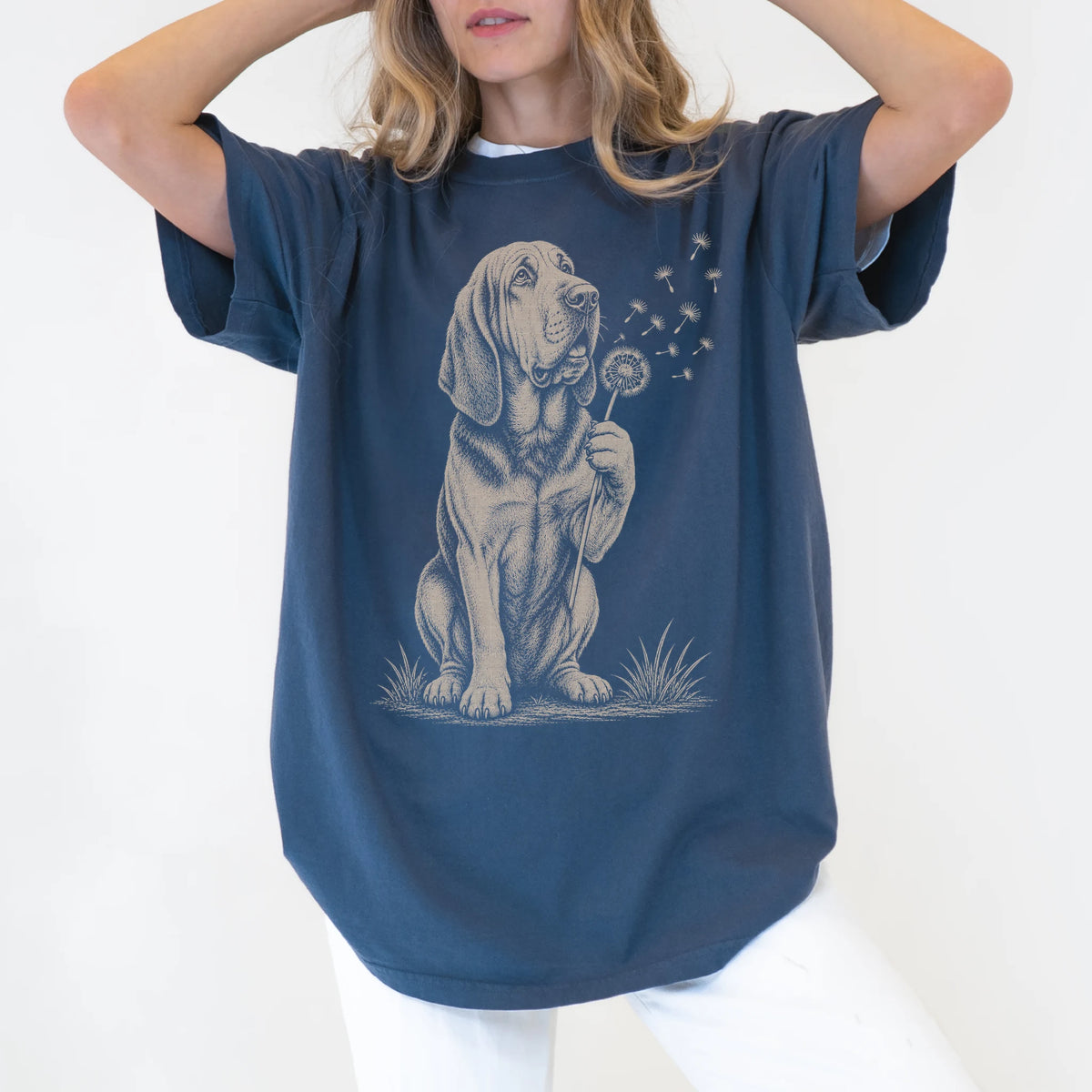Model wearing a Denim Comfort Colors® T-shirt showing Bloodhound portrait with drifting dandelion seeds