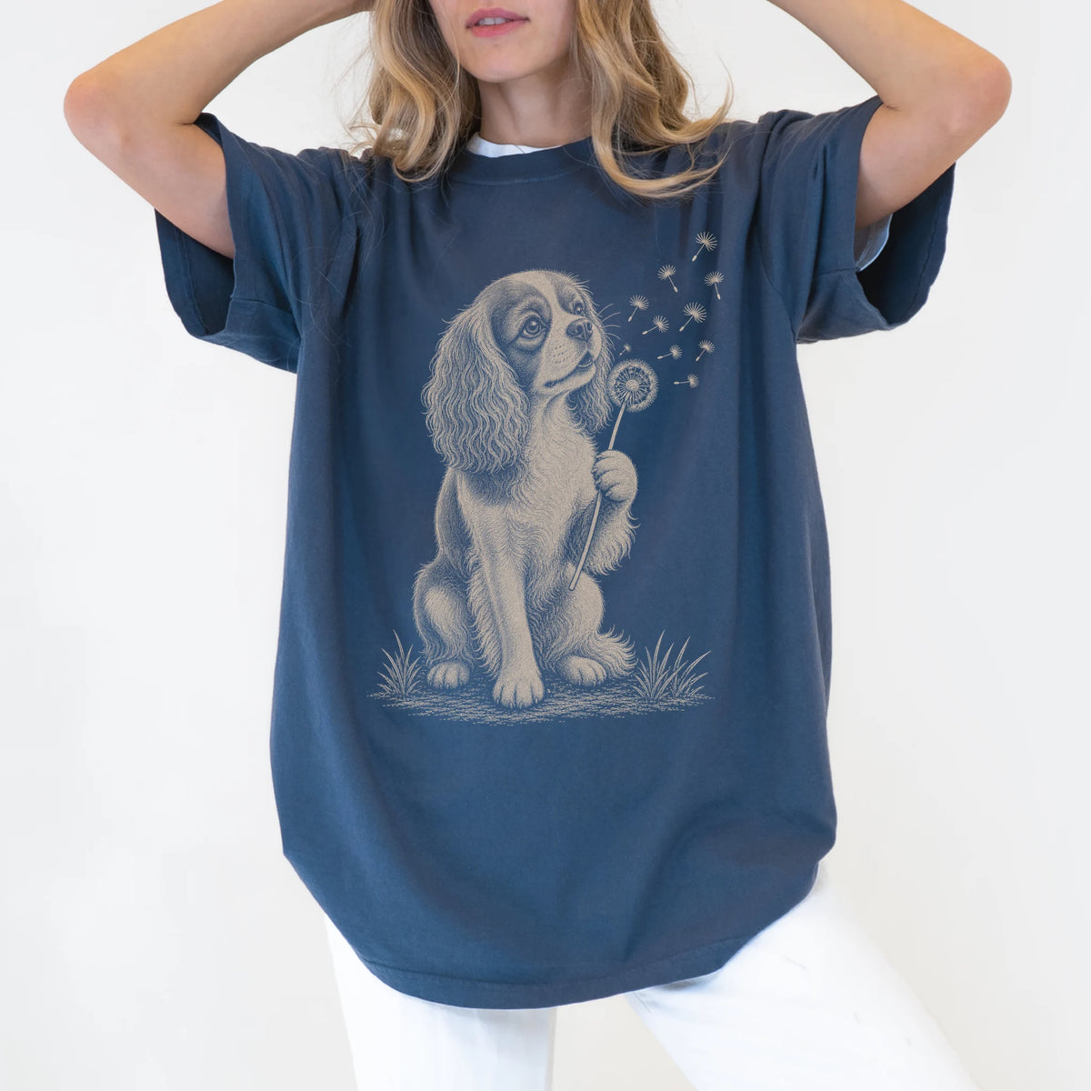 Model wearing a Denim Comfort Colors® T-shirt showing Cavalier King Charles Spaniel portrait with drifting dandelion seeds