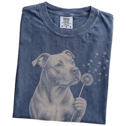 Folded Denim Comfort Colors® T-shirt showing Pitbull portrait with drifting dandelion seeds
