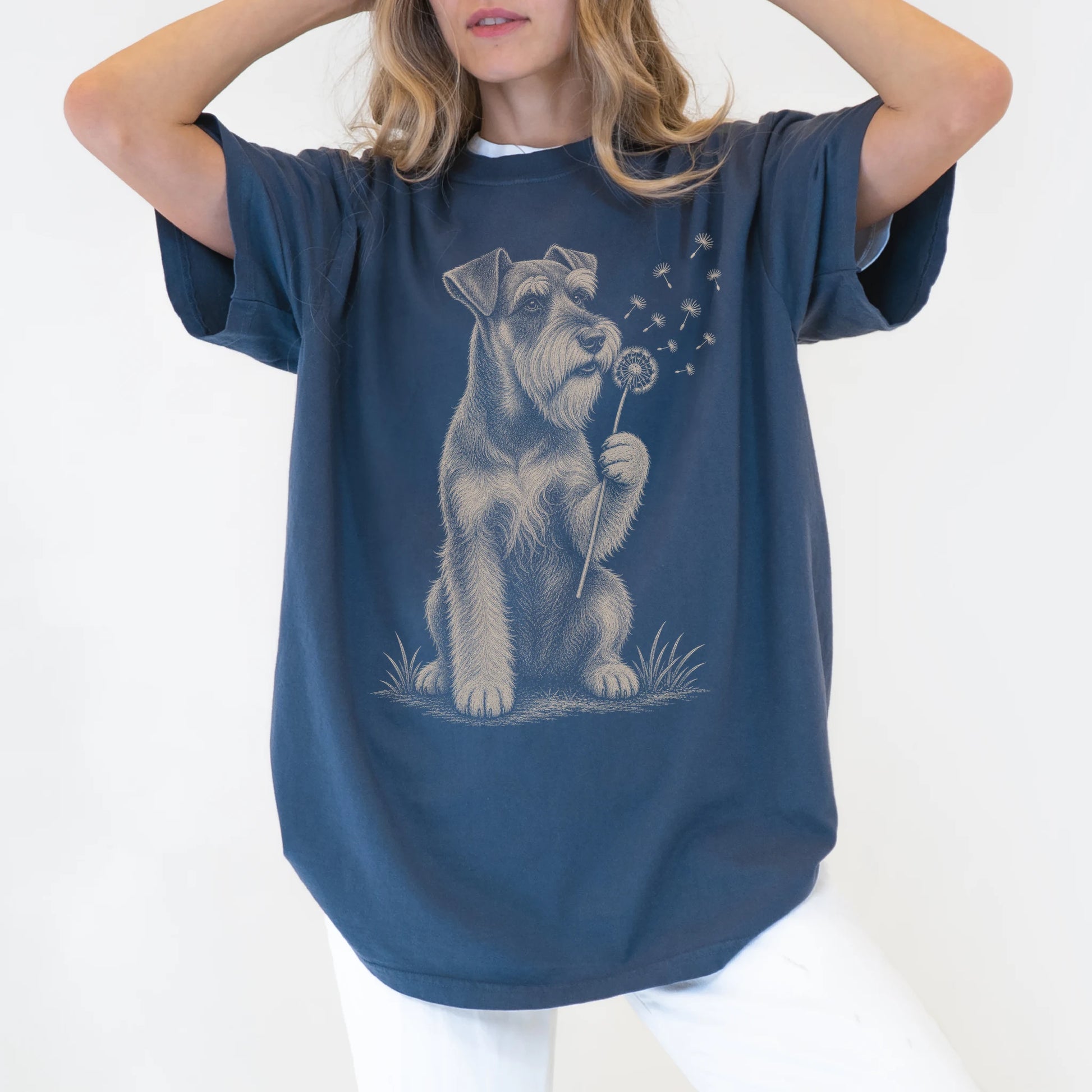 Model wearing a Denim Comfort Colors® T-shirt showing Standard Schnauzer portrait with drifting dandelion seeds