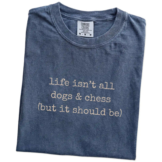 Folded Denim Comfort Colors® T-shirt showing dog-themed chess graphic