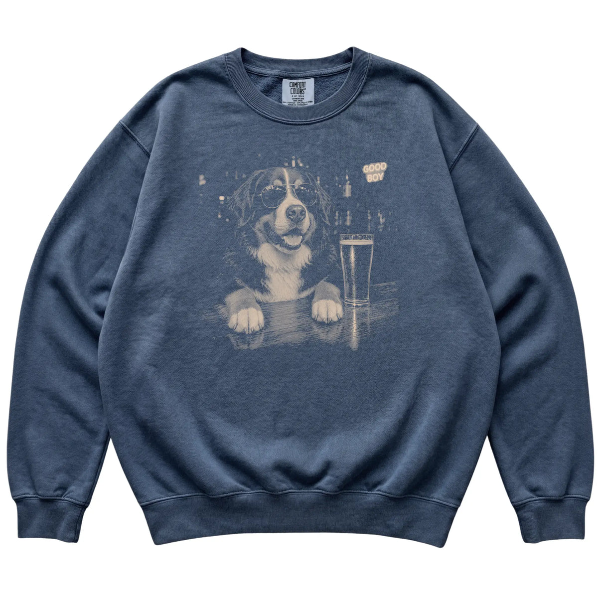 Denim Bernese Mountain Dog at a bar beside a pint, laid flat