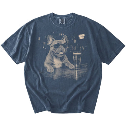Denim Frenchie at a bar beside a pint, laid flat