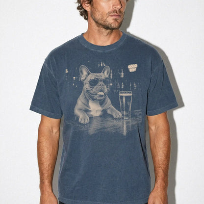 Denim Frenchie at a bar beside a pint, worn in a studio setting