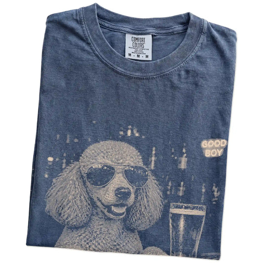 Denim Poodle at a bar beside a pint, folded detail view
