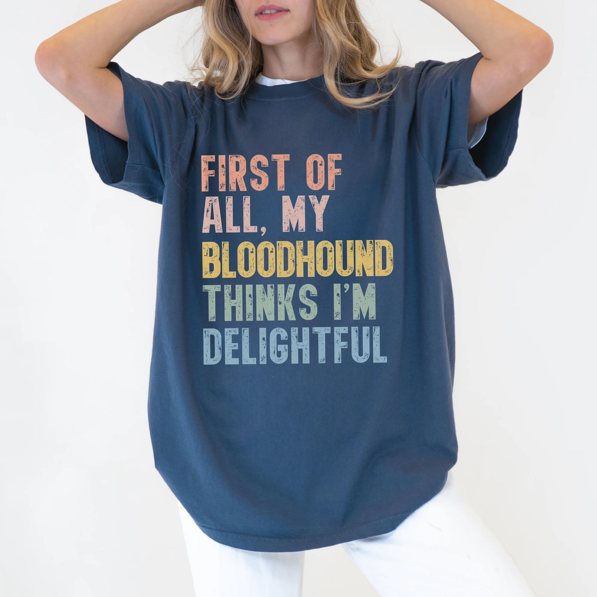 Model wearing a Denim Comfort Colors® T-shirt with “My Bloodhound thinks I’m delightful” text