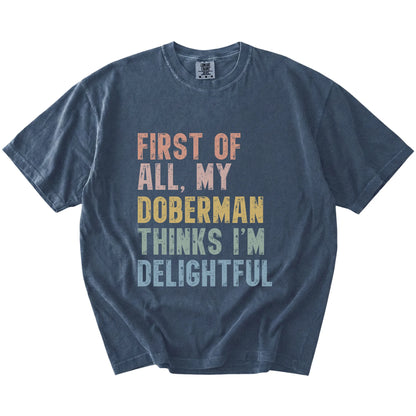 “My Doberman thinks I’m delightful” text on a Denim Comfort Colors® T-shirt