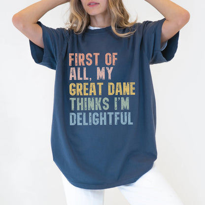 Model wearing a Denim Comfort Colors® T-shirt with “My Great Dane thinks I’m delightful” text
