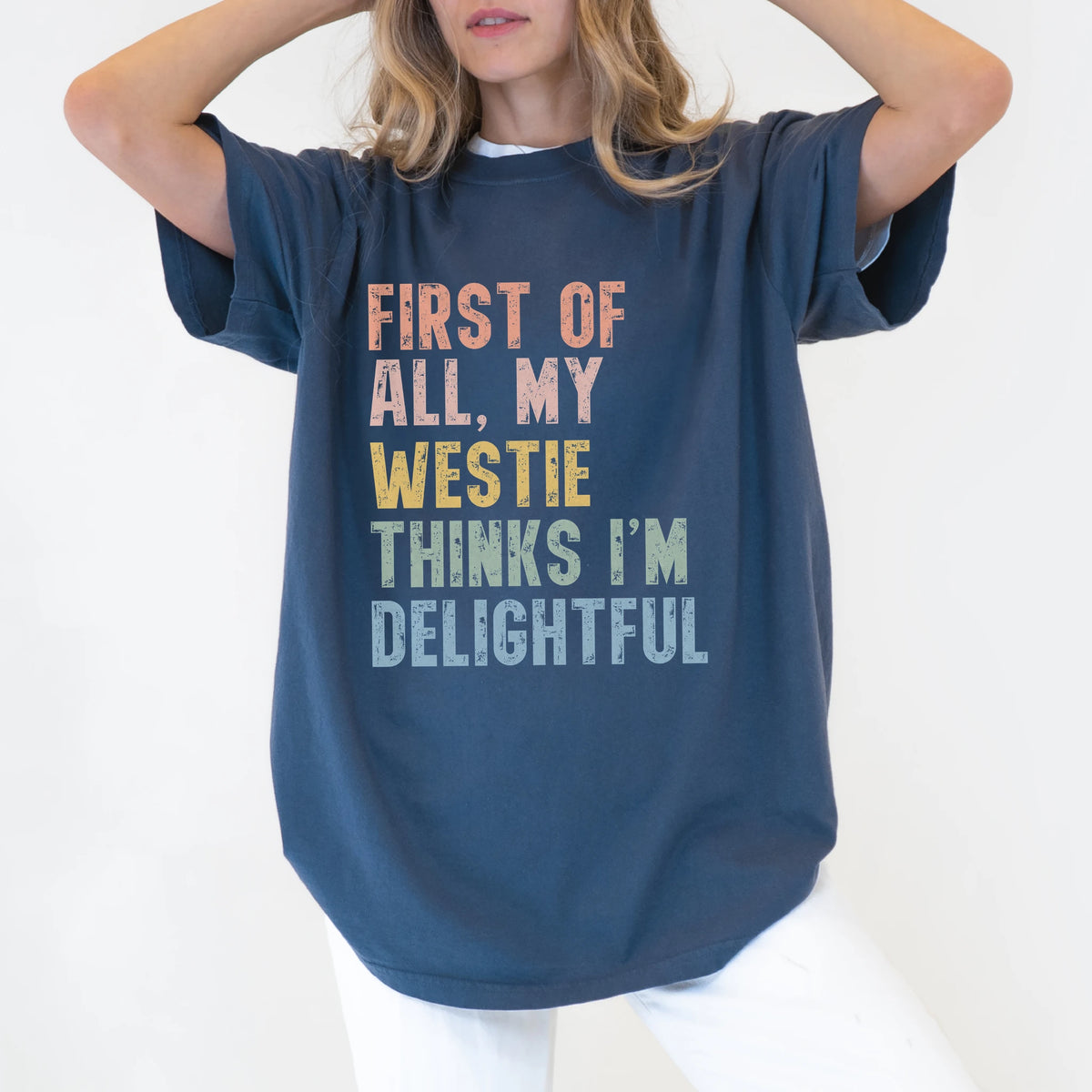 Model wearing a Denim Comfort Colors® T-shirt with “My Westie thinks I’m delightful” text