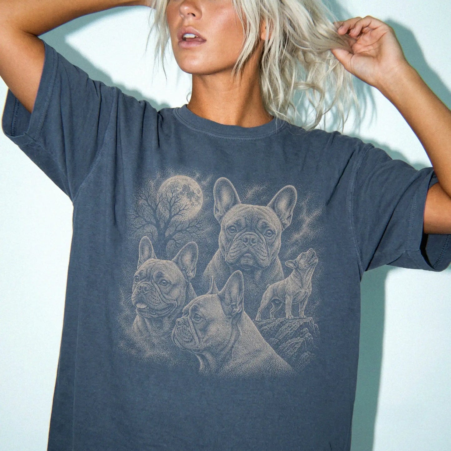 Model wearing a Denim Comfort Colors® T-shirt with a vintage moon montage featuring French Bulldog