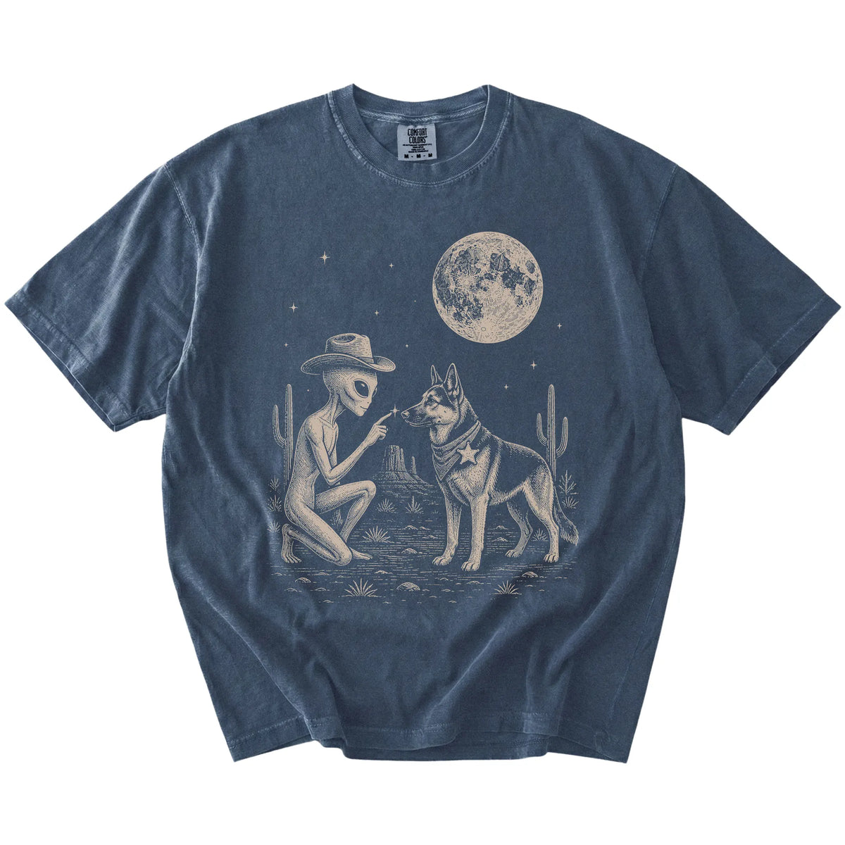 Cowboy alien fist-bumping a German Shepherd beneath the moon on a Denim Comfort Colors® T-shirt