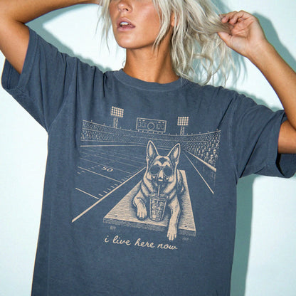 Model wearing a Denim Comfort Colors® T-shirt featuring German Shepherd ready for football and tailgate season