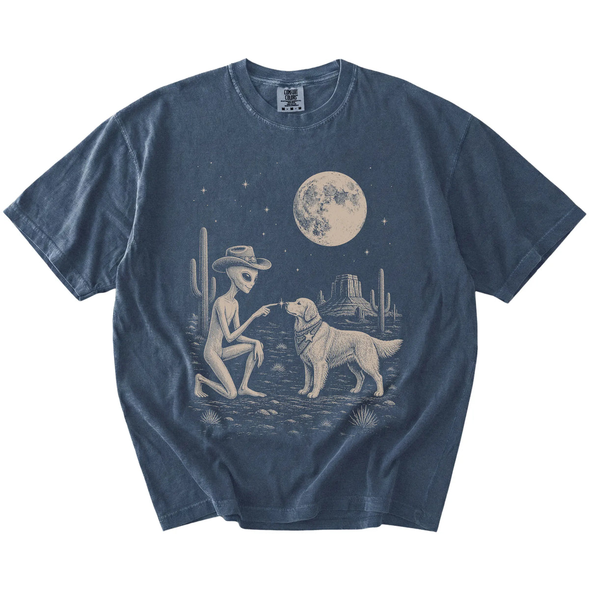 Cowboy alien fist-bumping a Golden Retriever beneath the moon on a Denim Comfort Colors® T-shirt