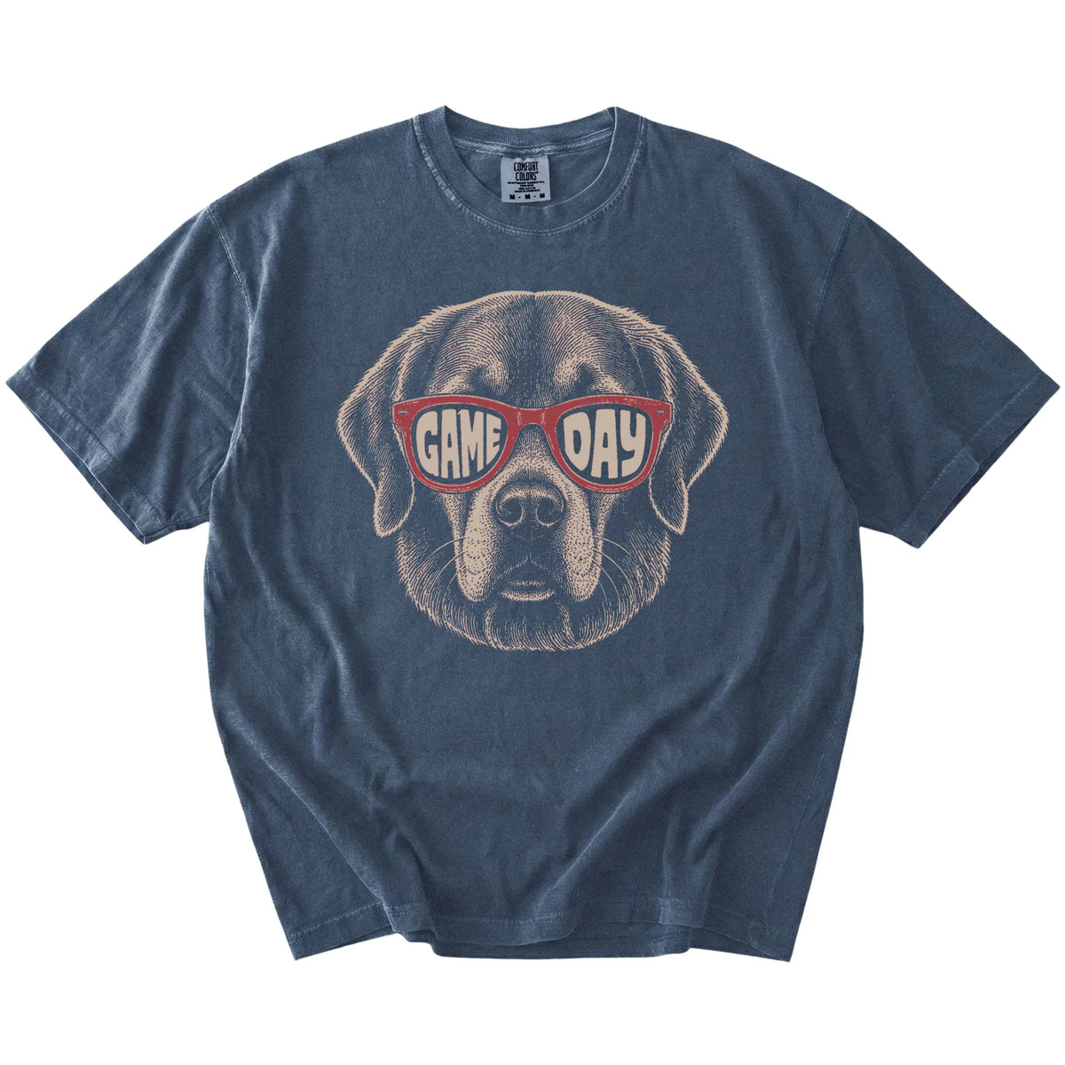 Golden Retriever wearing red Game Day sunglasses on a Denim Comfort Colors® T-shirt
